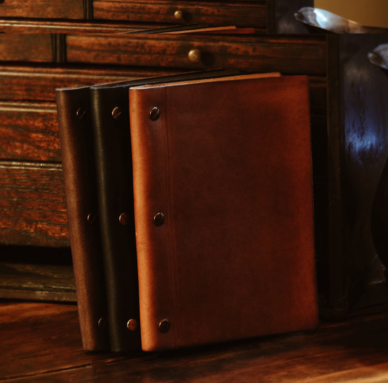 Powerplay Studios offers a wide range of Borlino Italian Padfolios and Journals with your custom logo debossed on the for Corporate Gift Sets. 